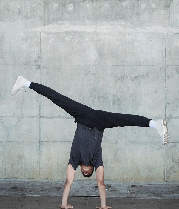 Man stretching outdoors feeling flexible and strong.